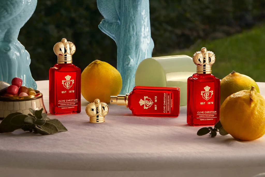 Red perfume bottles with gold crowns on top - British perfume brands