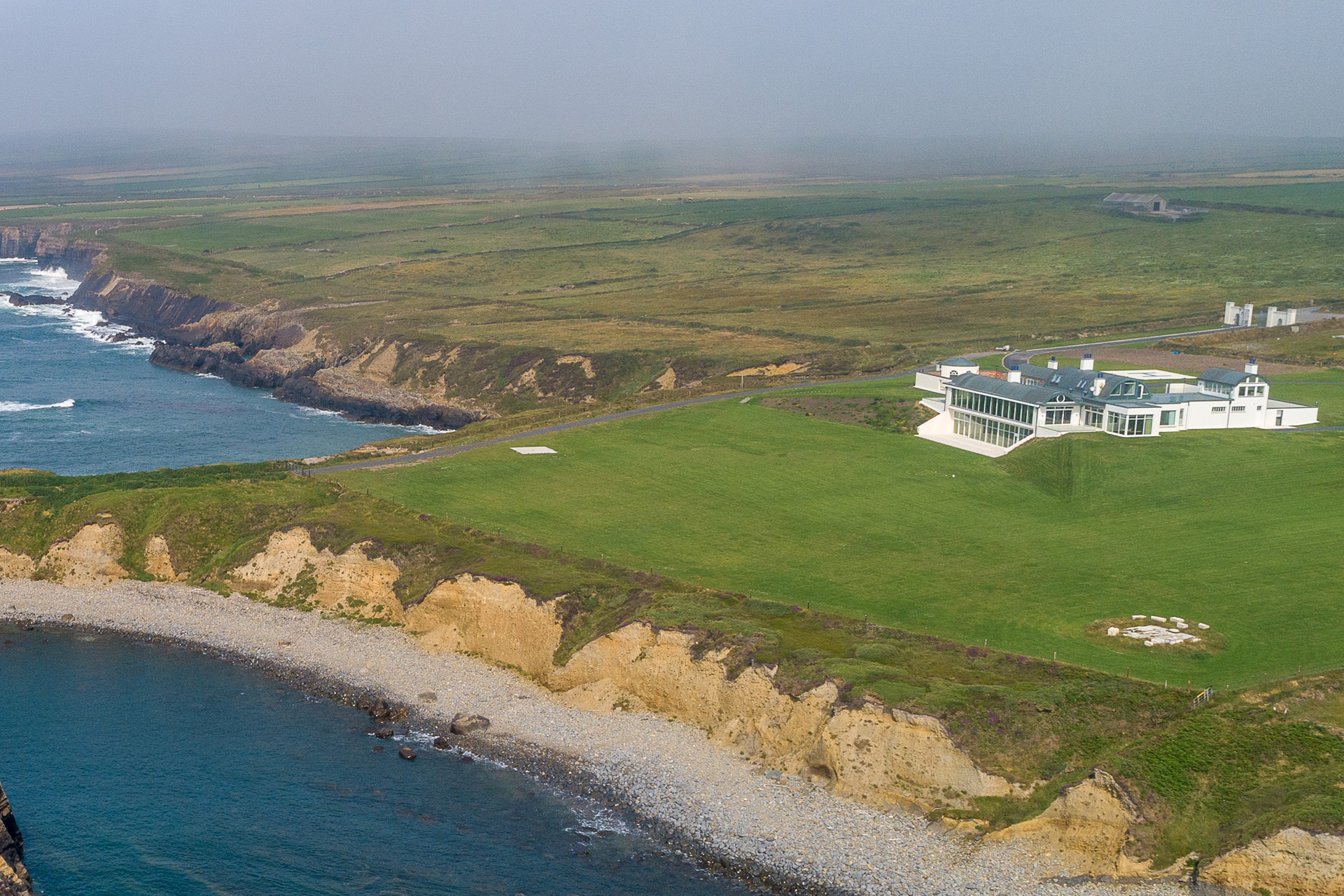 Aerial view of DUnmore Bay with coastline on the left.