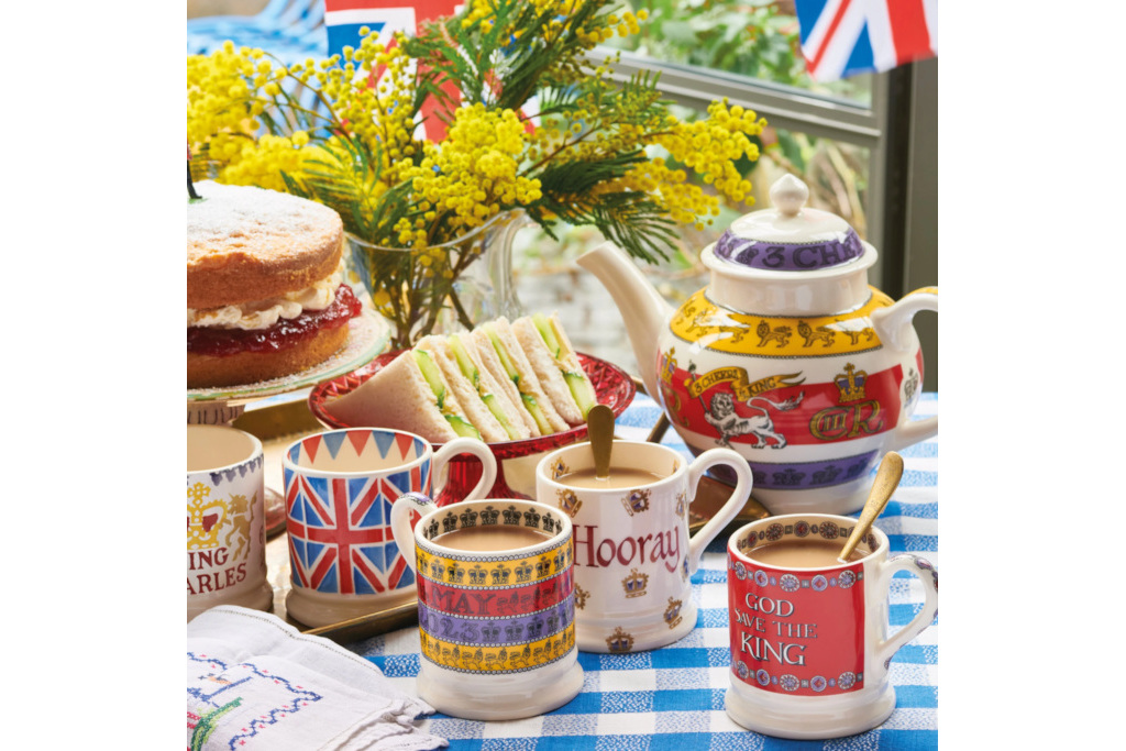 Mugs and tea pot with coronation themed decoration