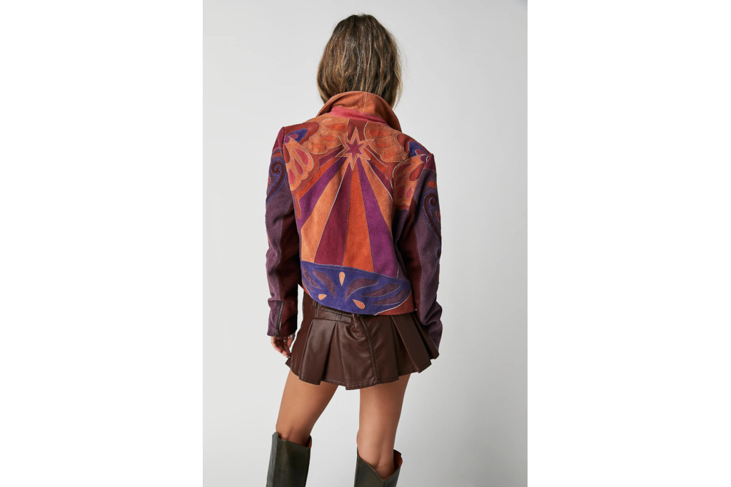 Woman in patchwork jacket