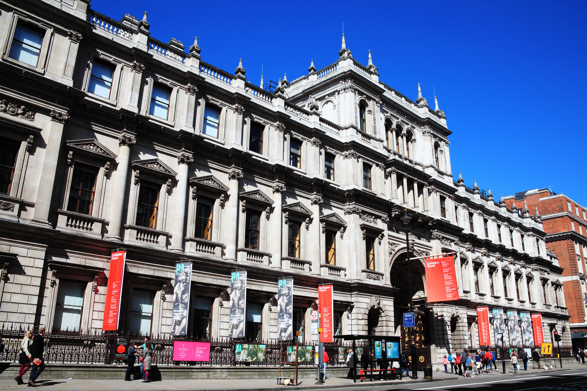 The Royal Academy of Arts is an arts institution based at Burlington House on Piccadilly. The banners are advertising summer exhibitions