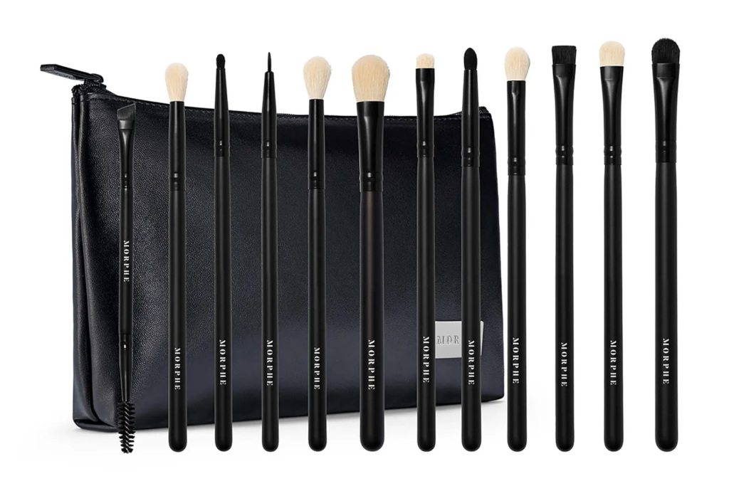 Black makeup brushes on black bag