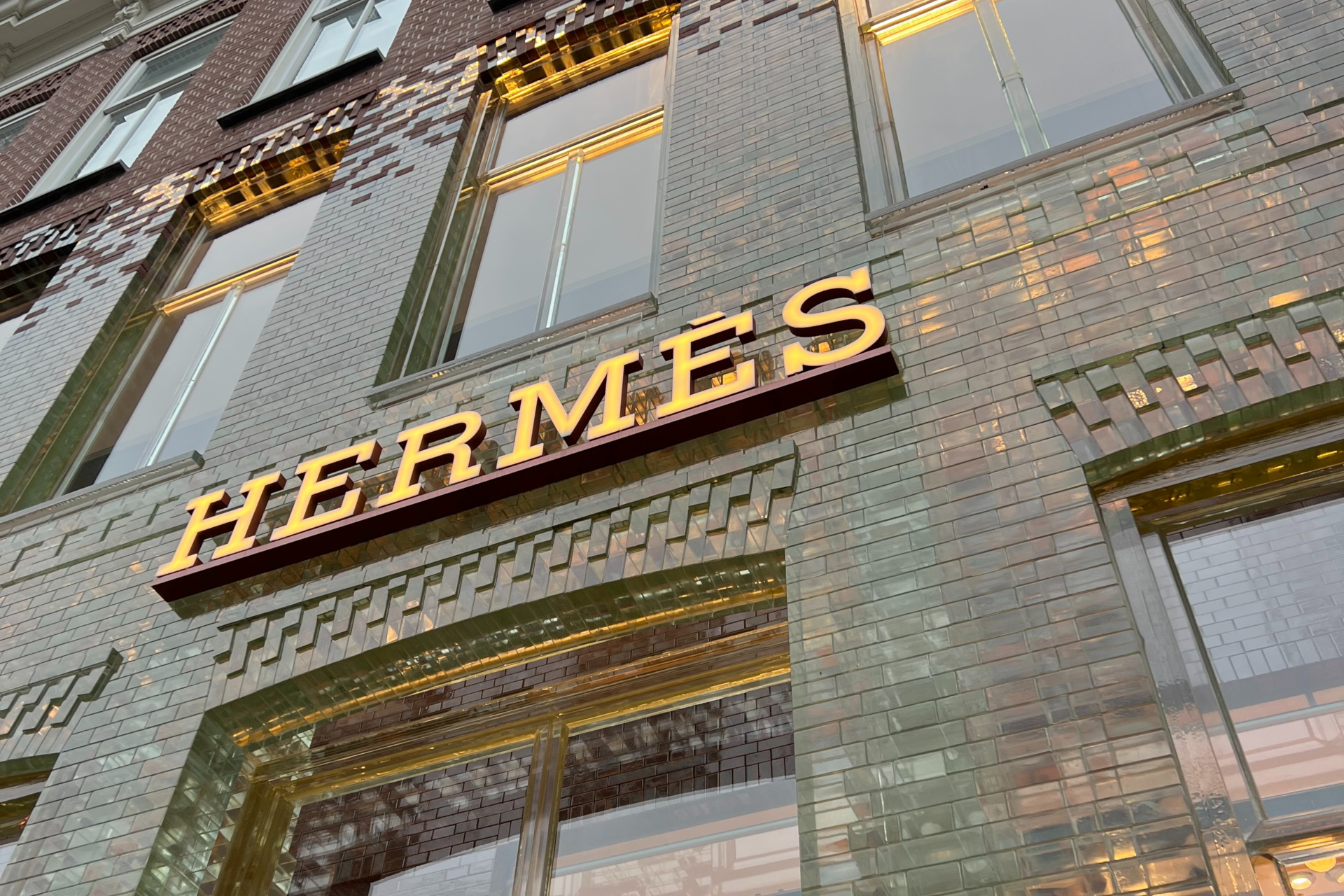 Close up of Hermes sign on building