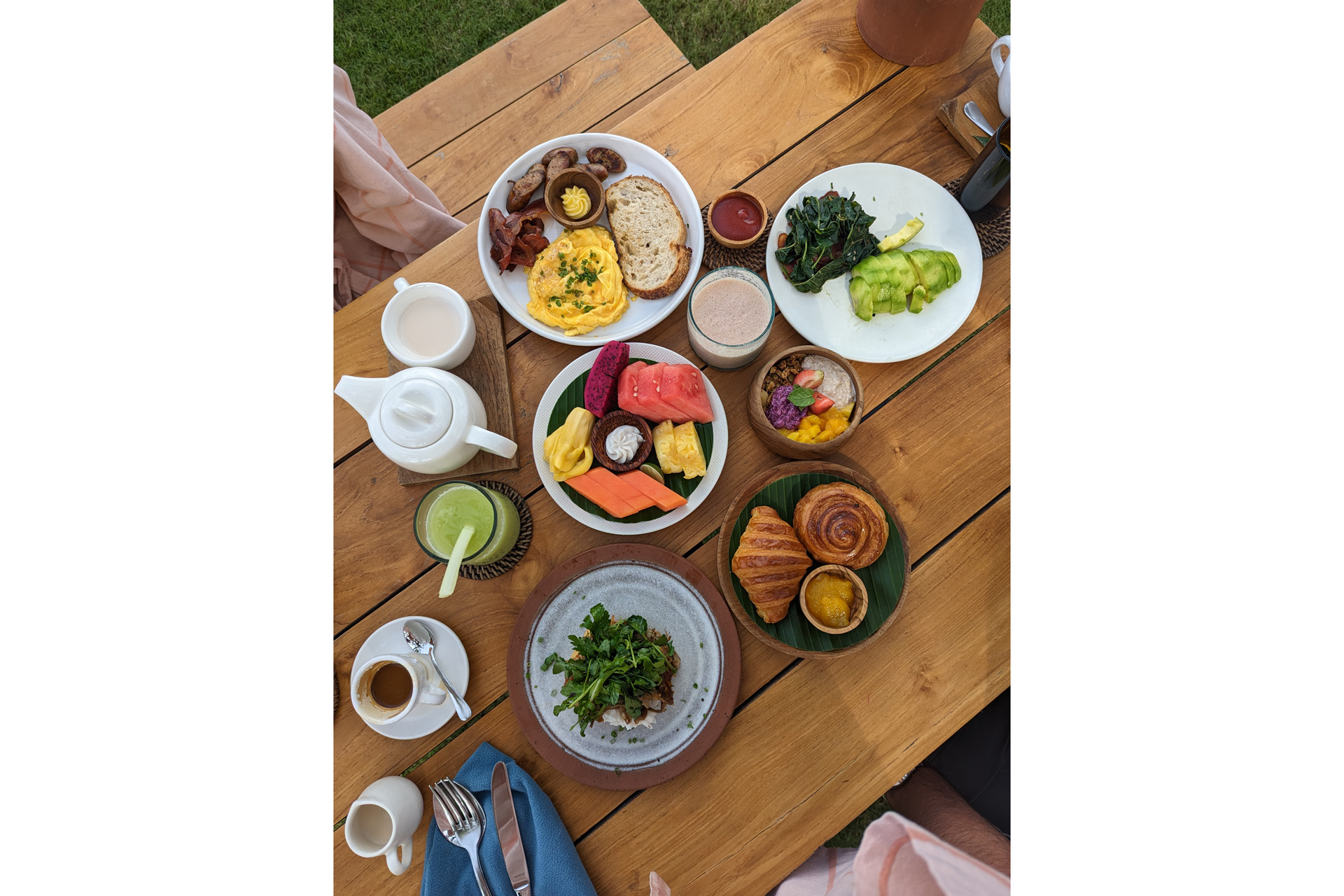 Breakfast dishes on a wooden table in Bali
