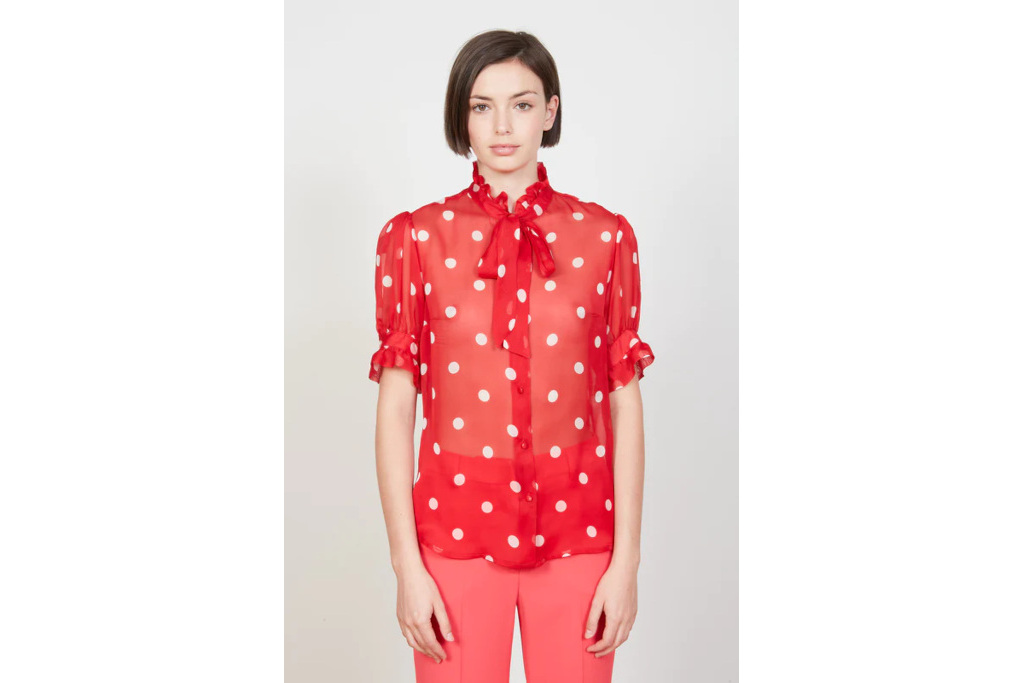 Woman in red polka dot shirt