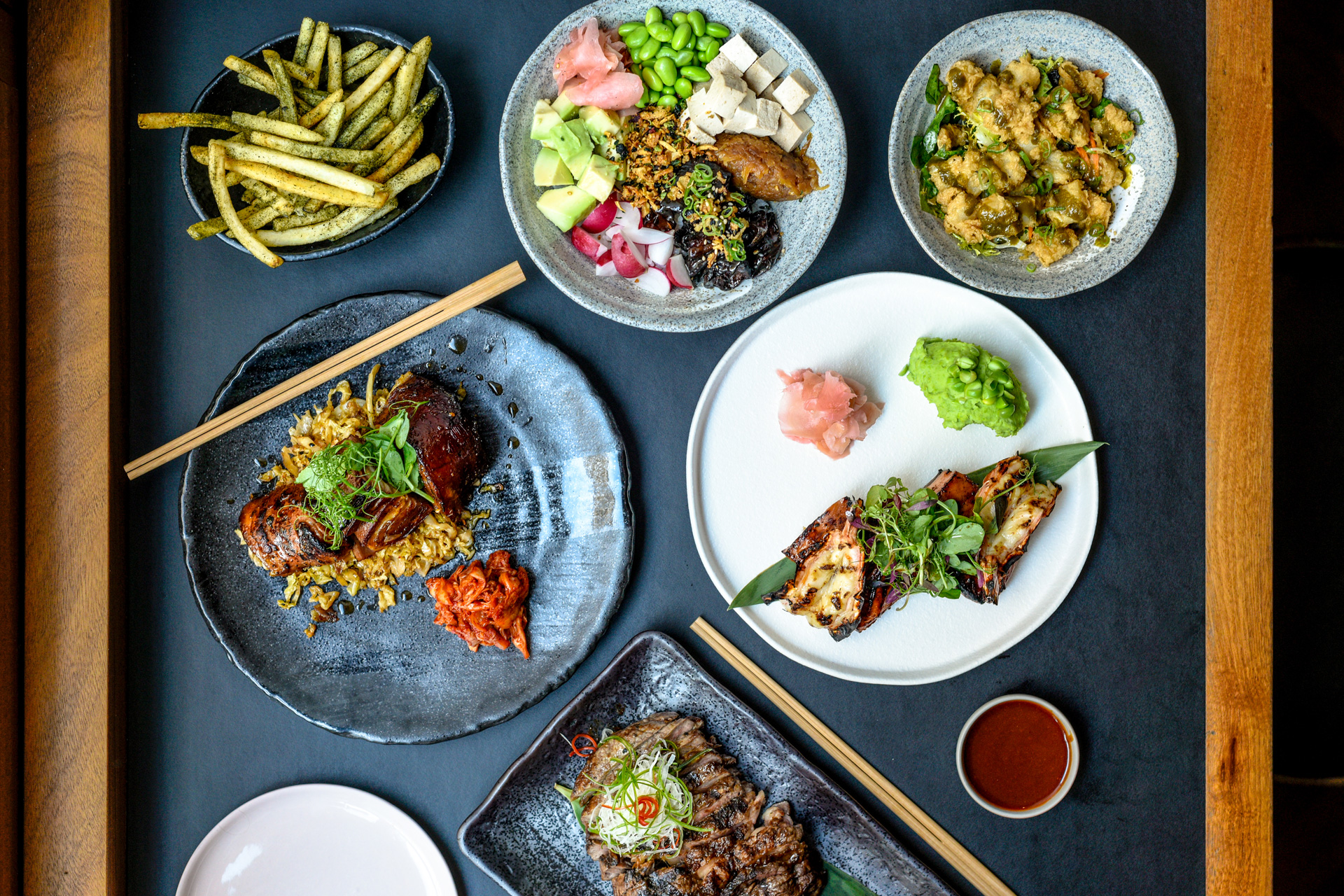 Plates of food at Apothecary East