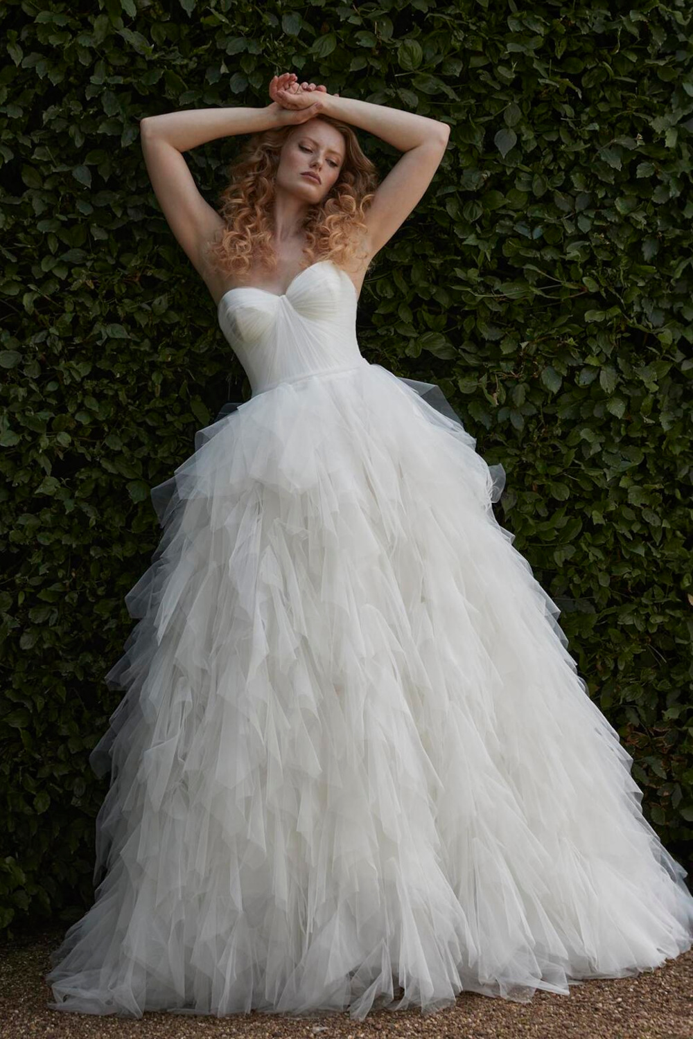 Woman in ruffled wedding dress