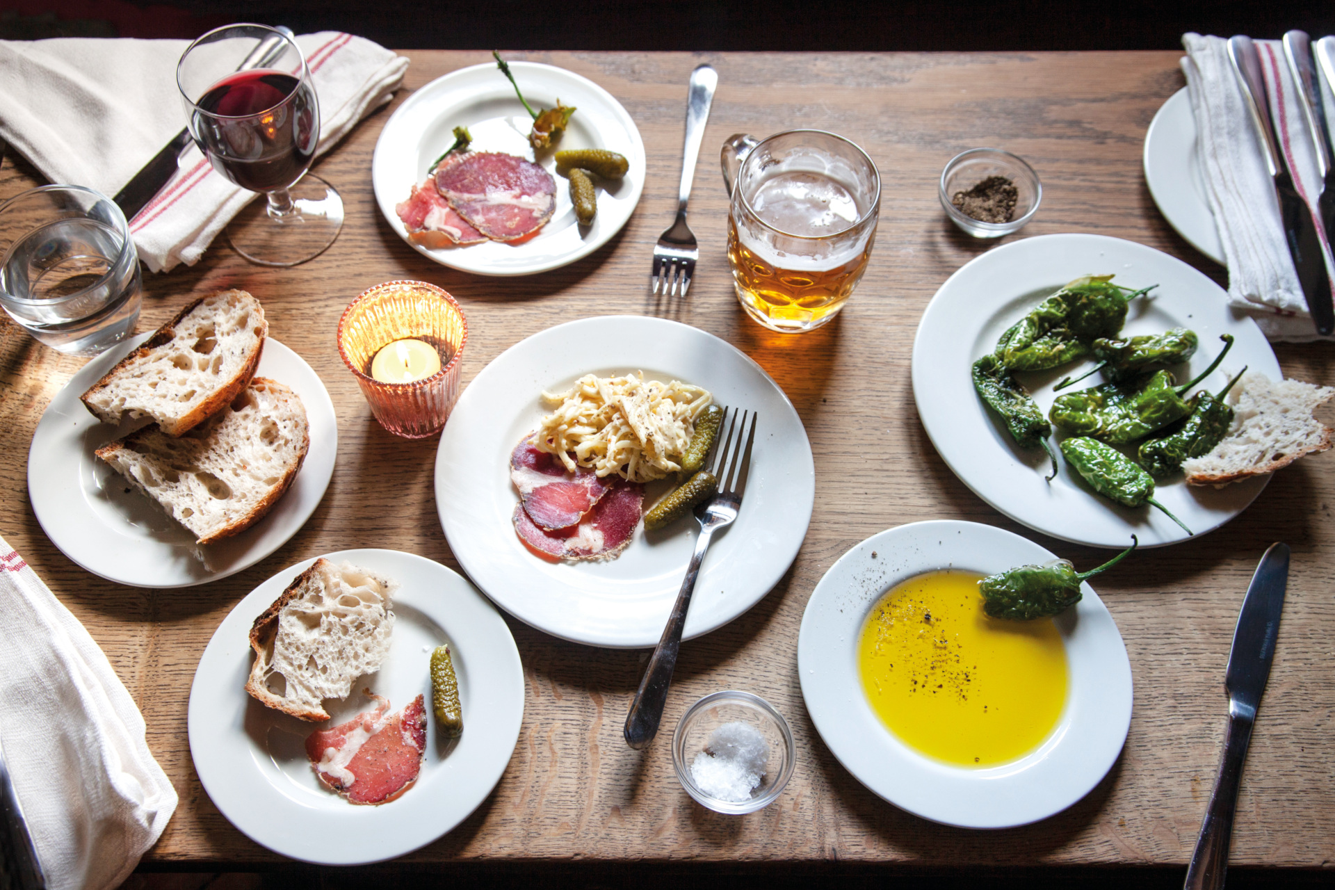 Plates of food on wooden table