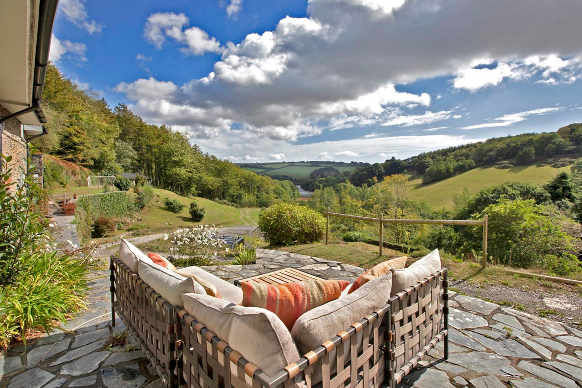 Patio with garden sofa and views overlooking the Avon estuary.