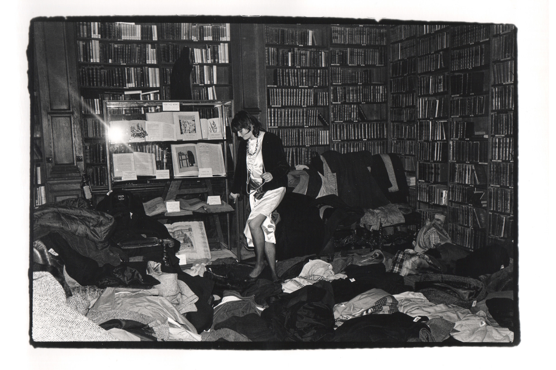 Georgia Metcalfe looking for her coat. Valentine Ball, Oxford Union. 1984