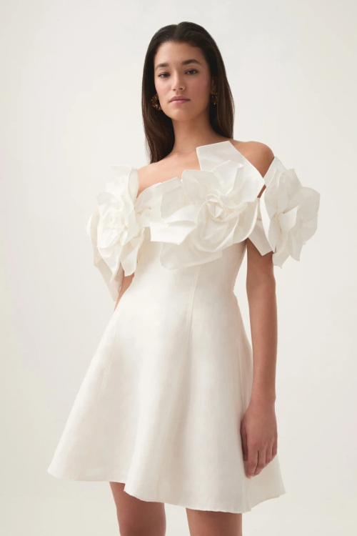 Woman in white mini