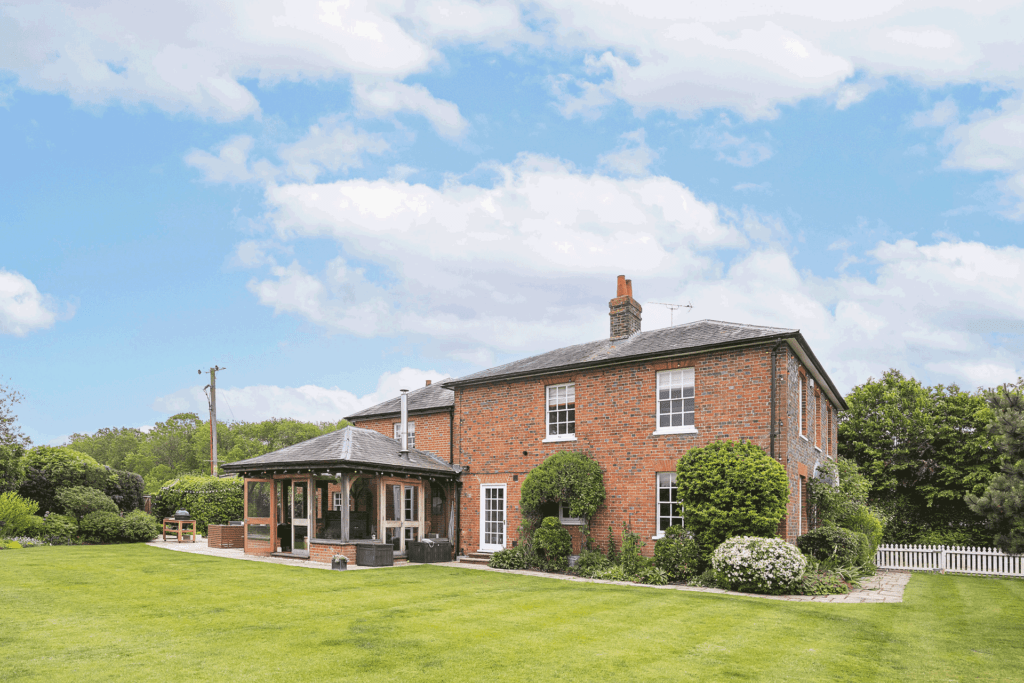 Red Brick farmhouse with a garden extension.