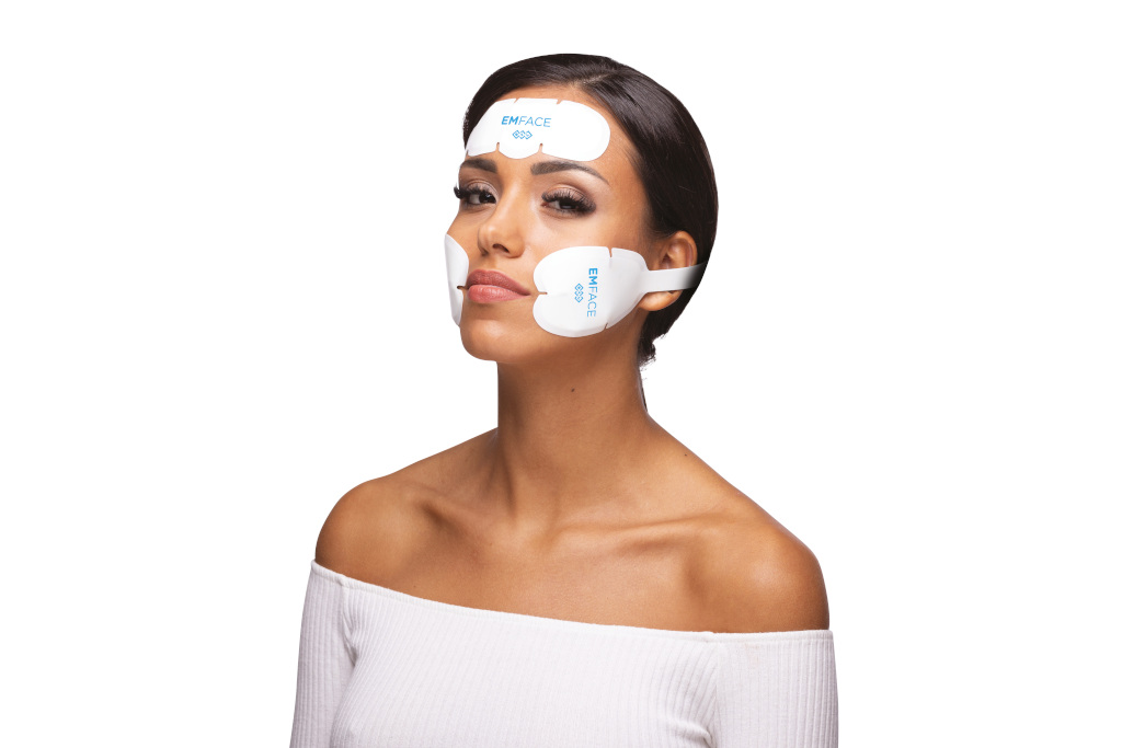 Woman wearing Emface device