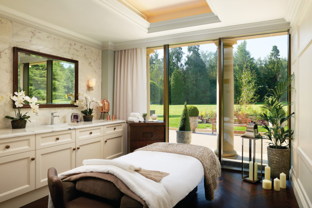 Spa bed with window looking out to garden