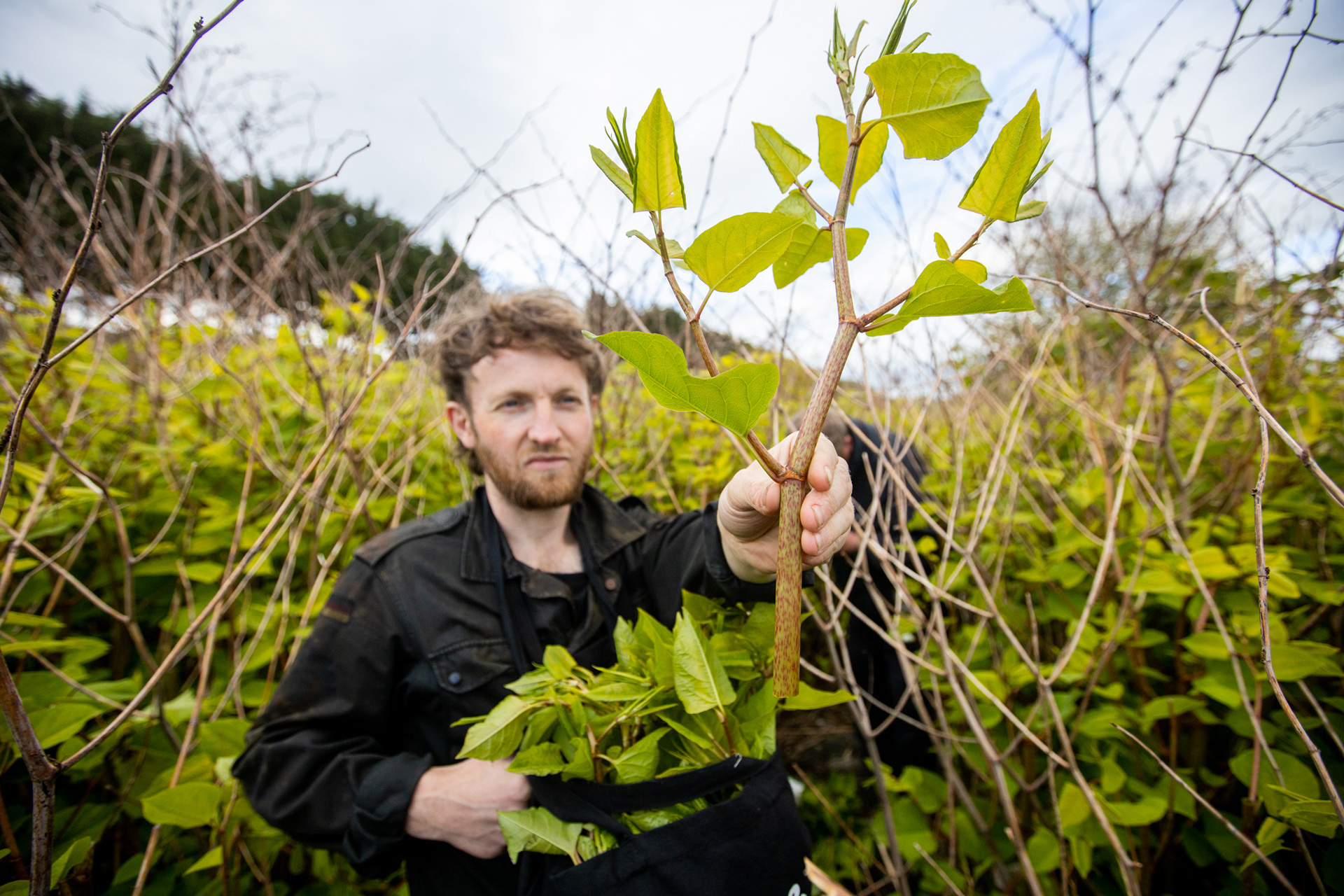 Douglas McMaster in a field