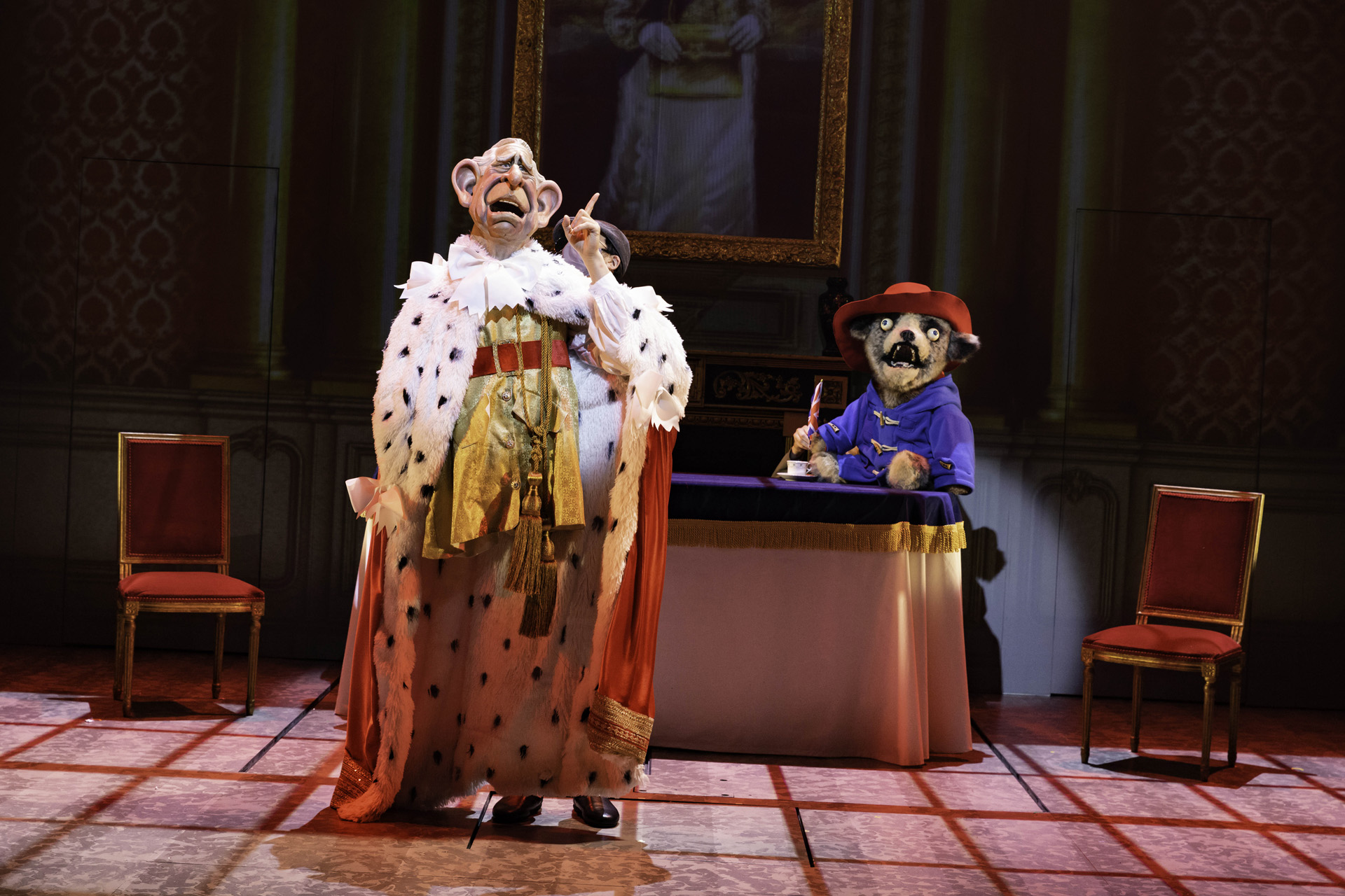 King Charles and Paddington Bear puppets on stage for Spitting Image