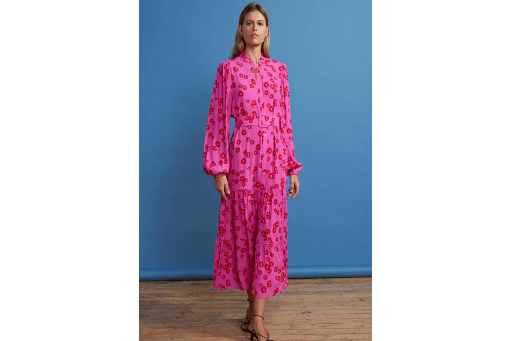 Woman in pink puff sleeve dress