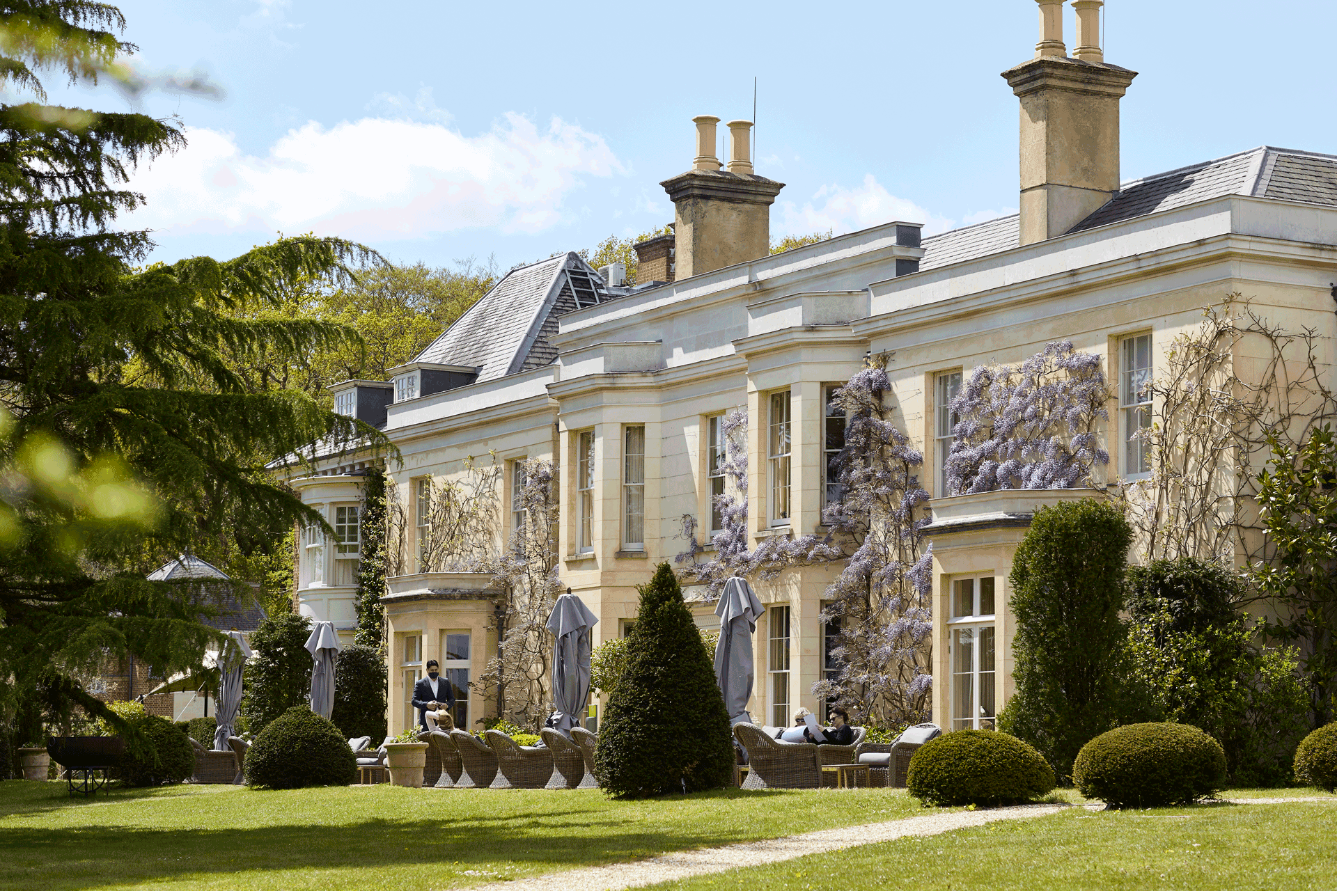 Wisteria-clad exterior of Lime Wood Hotel