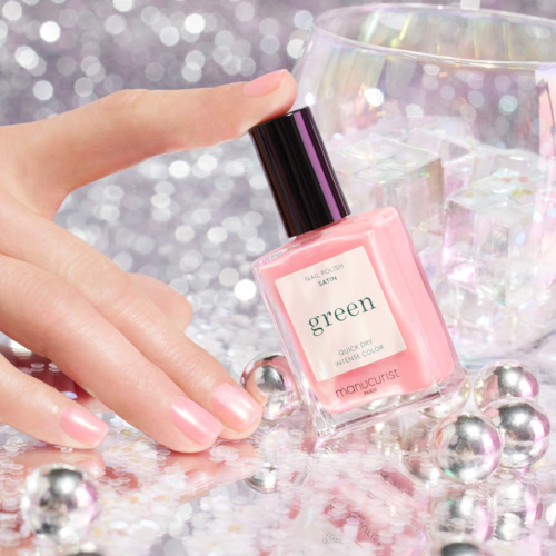 Hand tapping pink bottle