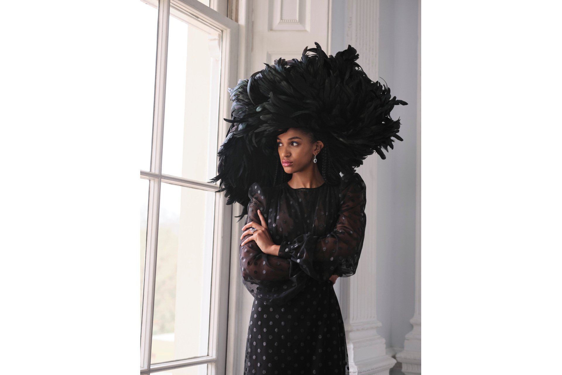 Woman in black dress and big feathered hat | Royal Ascot Lookbook 2024