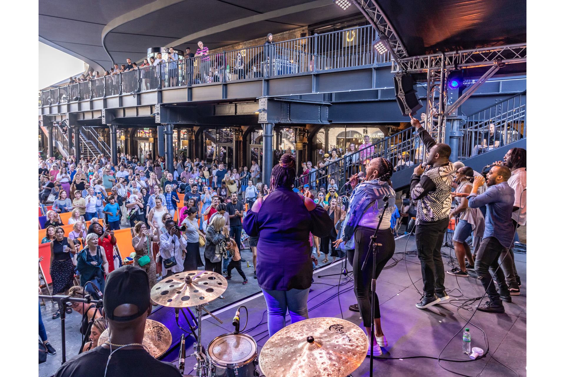 London Community Gospel Choir performing at King's Cross Summer Sounds Family Sunday, Coal Drops Yard