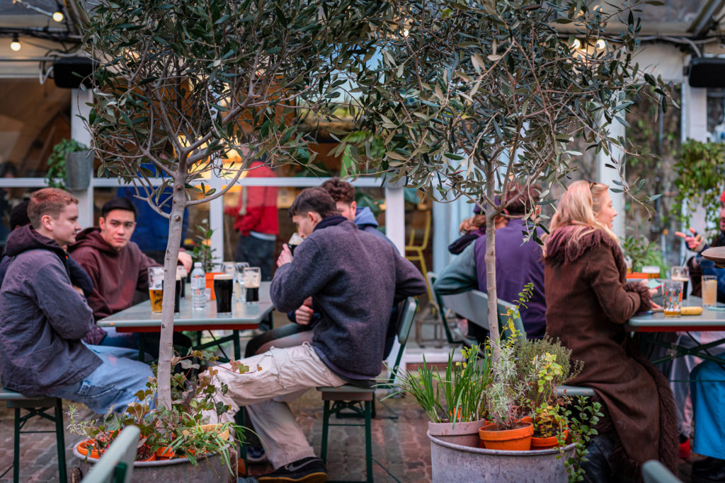 People drinking at Peckham Arches