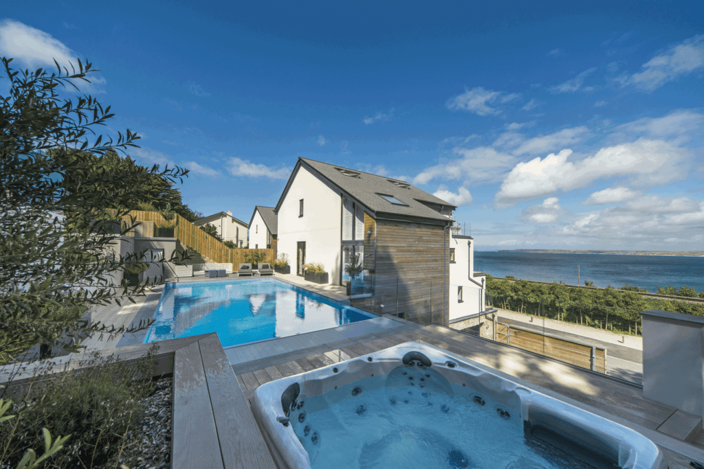Rear view of coastal house in Porthminster with a hot tub.