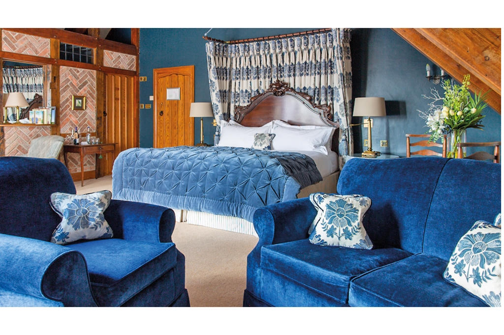 A bedroom in The Priory Hotel