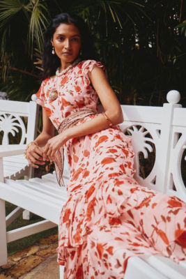 Woman in pink and red dress | What to wear to Chelsea Flower Show