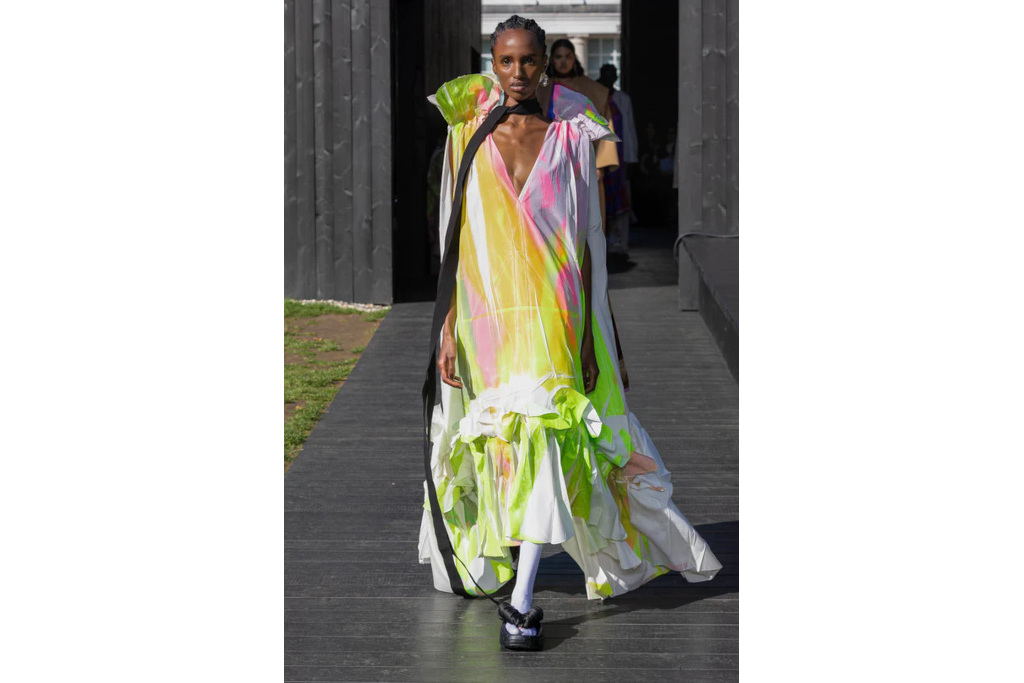 Woman in multicoloured dress