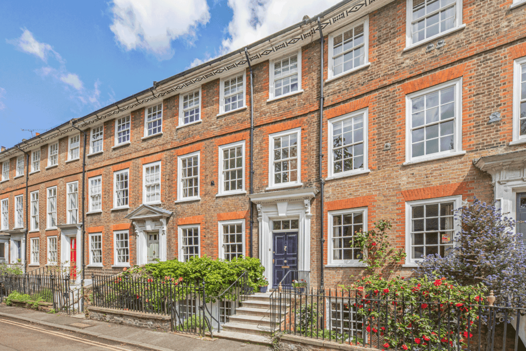 Red brick terraced houses overlooking the Thames.