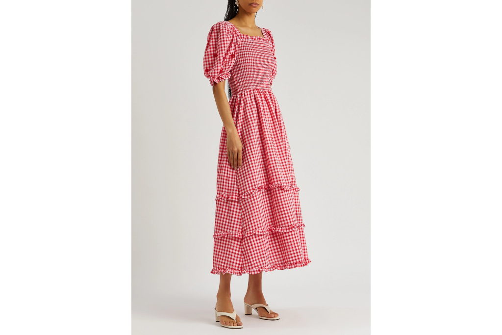 Woman in red check dress