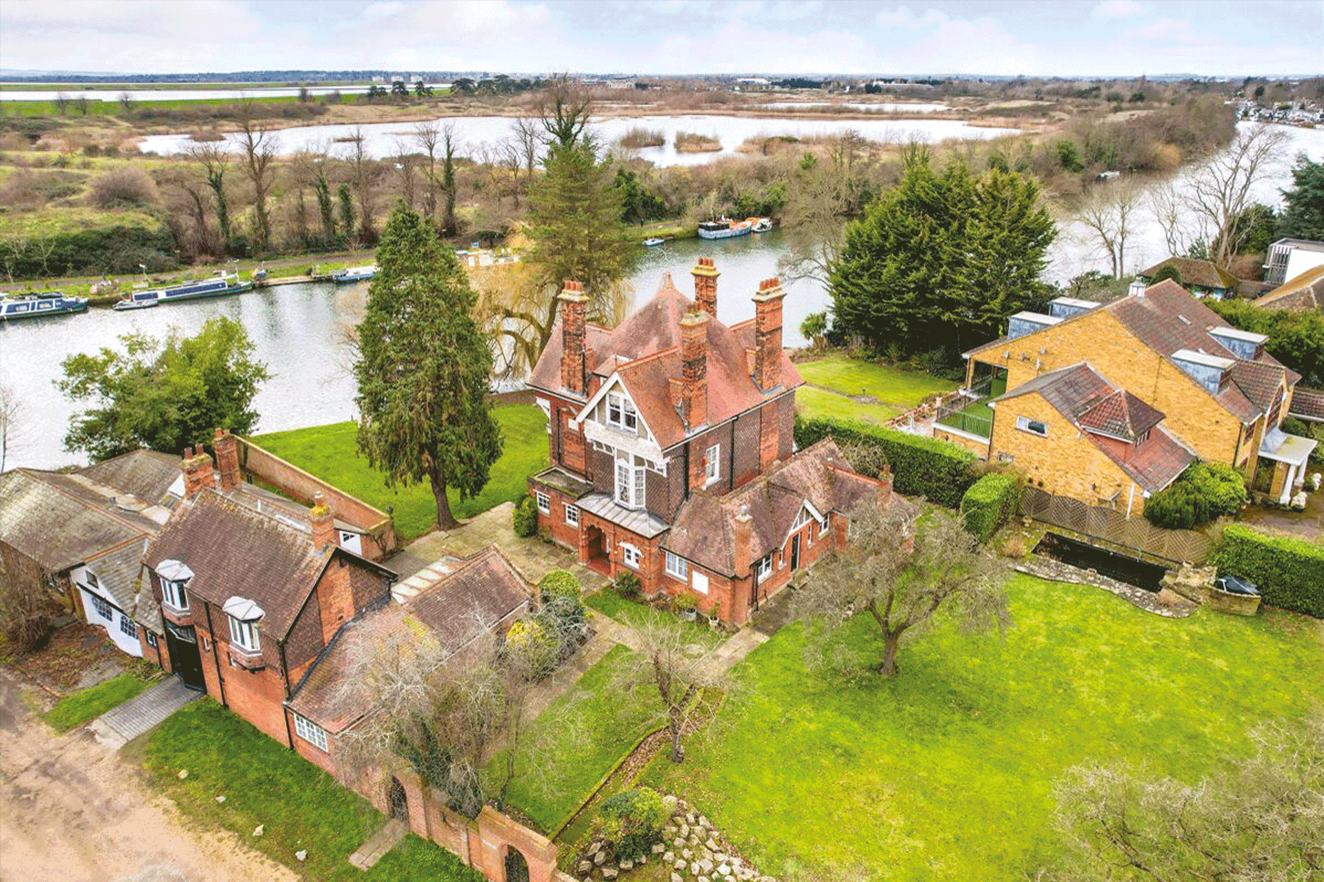 Aerial view of a red brick manor house in Sunbury.