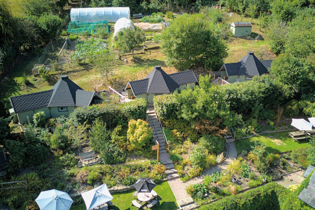 Overhead view of building with garden plots
