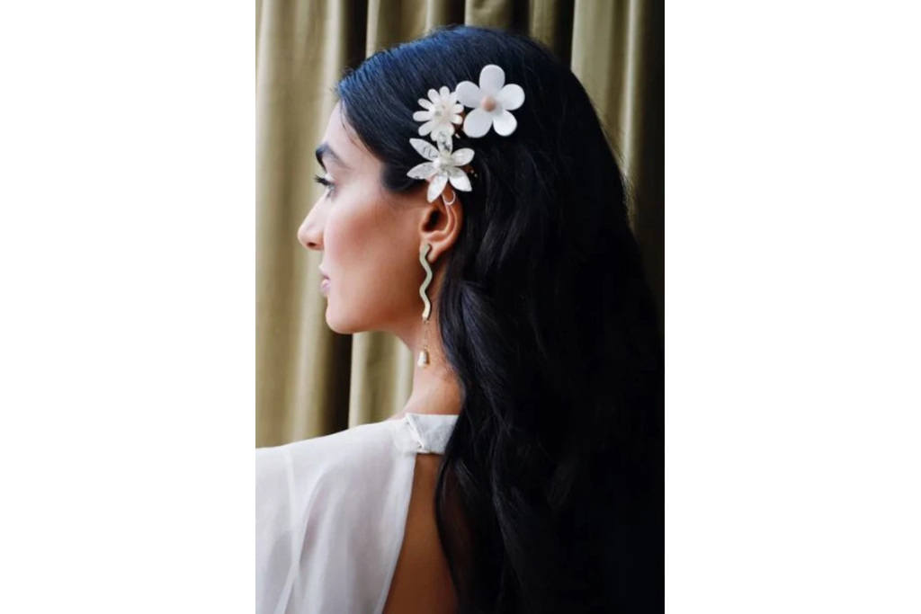 Woman with flower hair clips