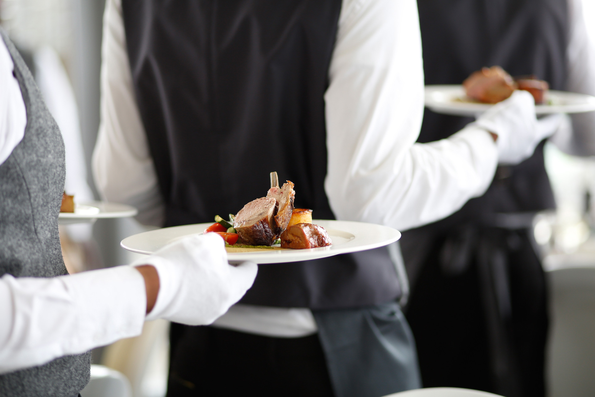 Waiters carrying food at Royal Ascot