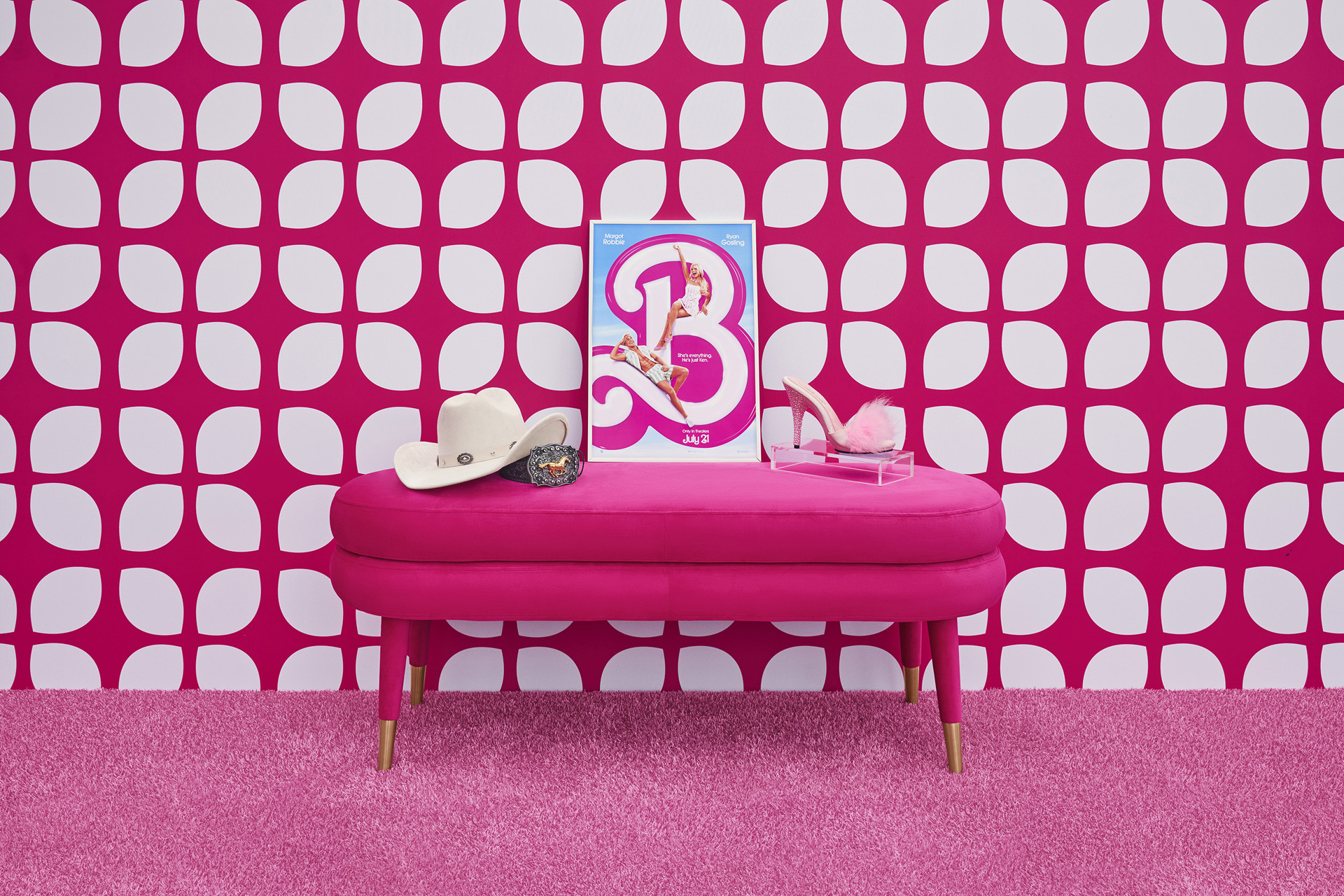 Barbie poster on a pink couch