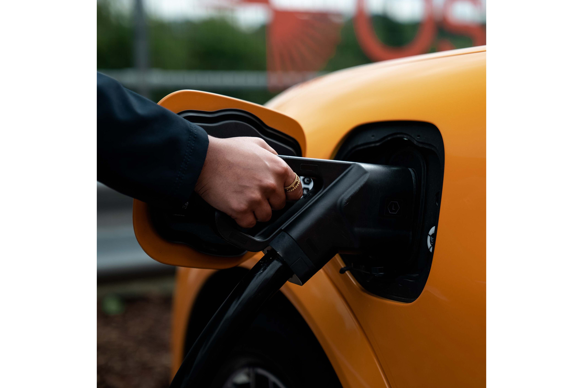 An Osprey Charging Network customer plugs in at an ultra-rapid charging location