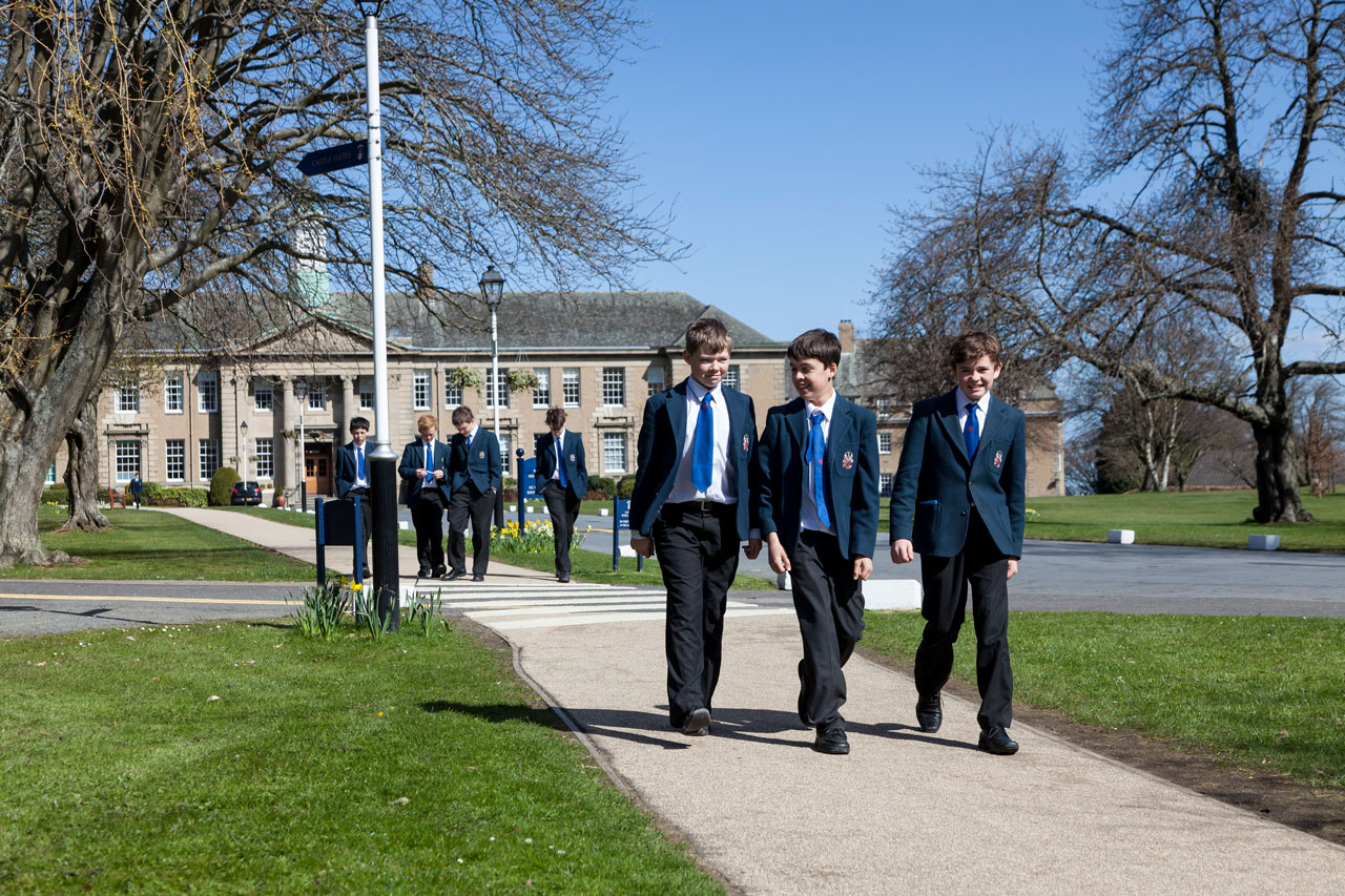 How can a school prepare boys for a working world dominated by creative and service industries that are traditionally accessed by women?