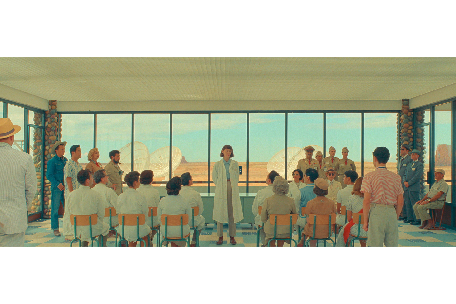 Rupert Friend as "Montana", Stephen Park as "Roger Cho", Hope Davis as "Sandy Borden", Jason Schwartzman as "Augie Steenbeck", Tilda Swinton as "Dr. Hickenlooper", Jeffrey Wright as "General Gibson", Tony Revolori as "Aide-de-Camp", Bob Balaban as "Larkings Executive", Mike Maggart as "Detective #2", Fisher Stevens as "Detective #1" in writer/director Wes Anderson's ASTEROID CITY