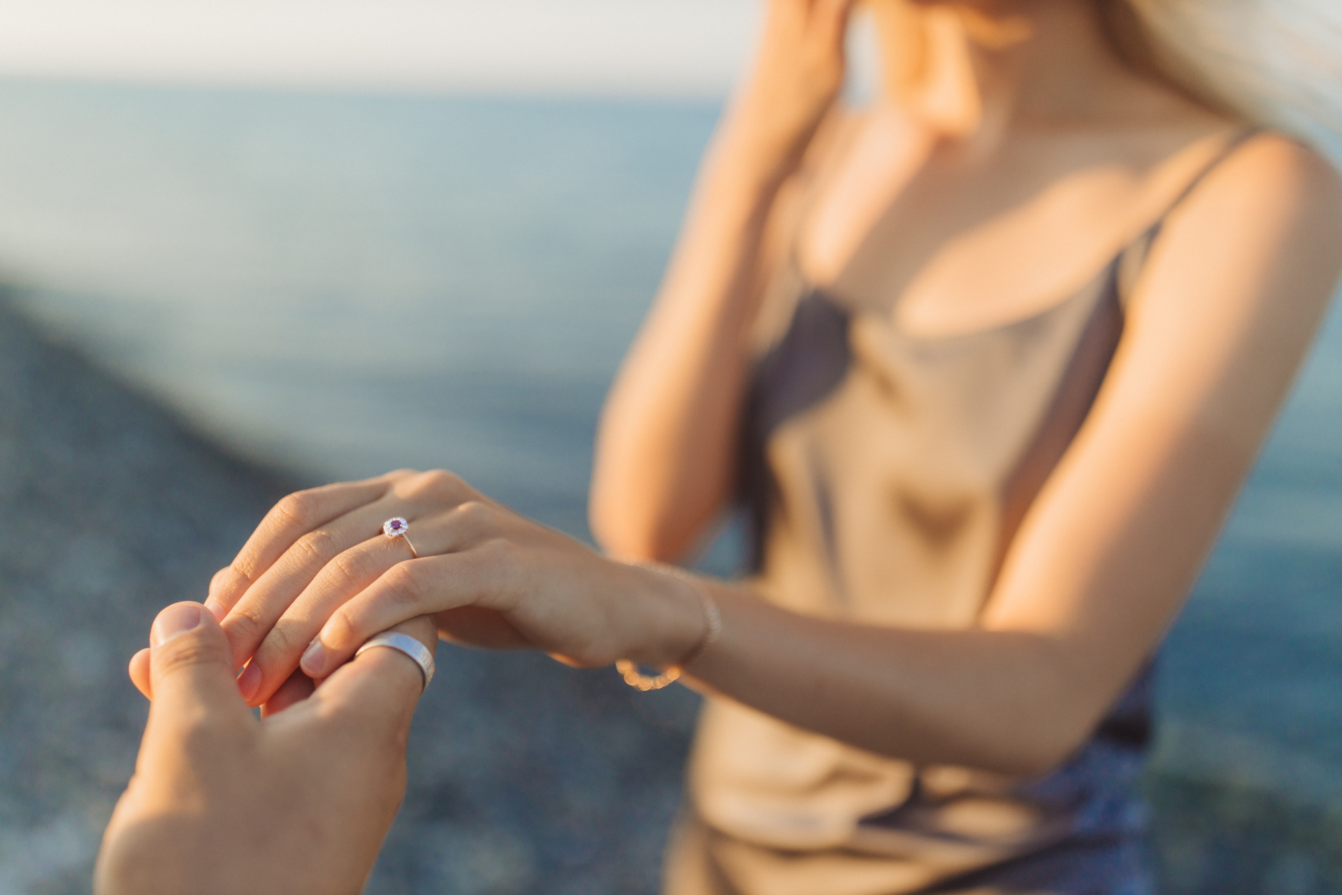 Close up of woman with wedding ring