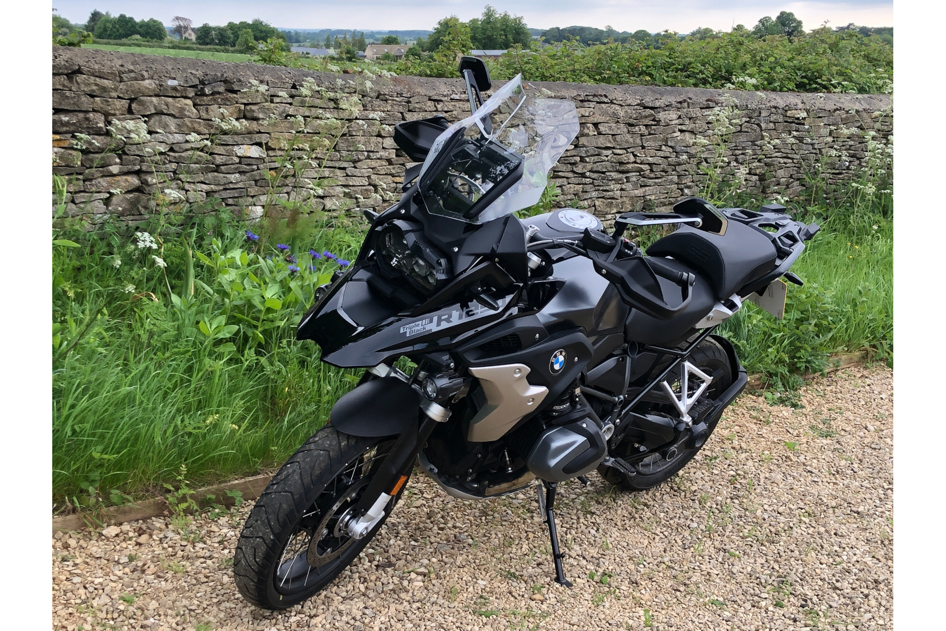 Motorbike on gravel drive