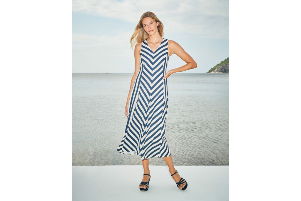 Woman in blue and white stripe dress