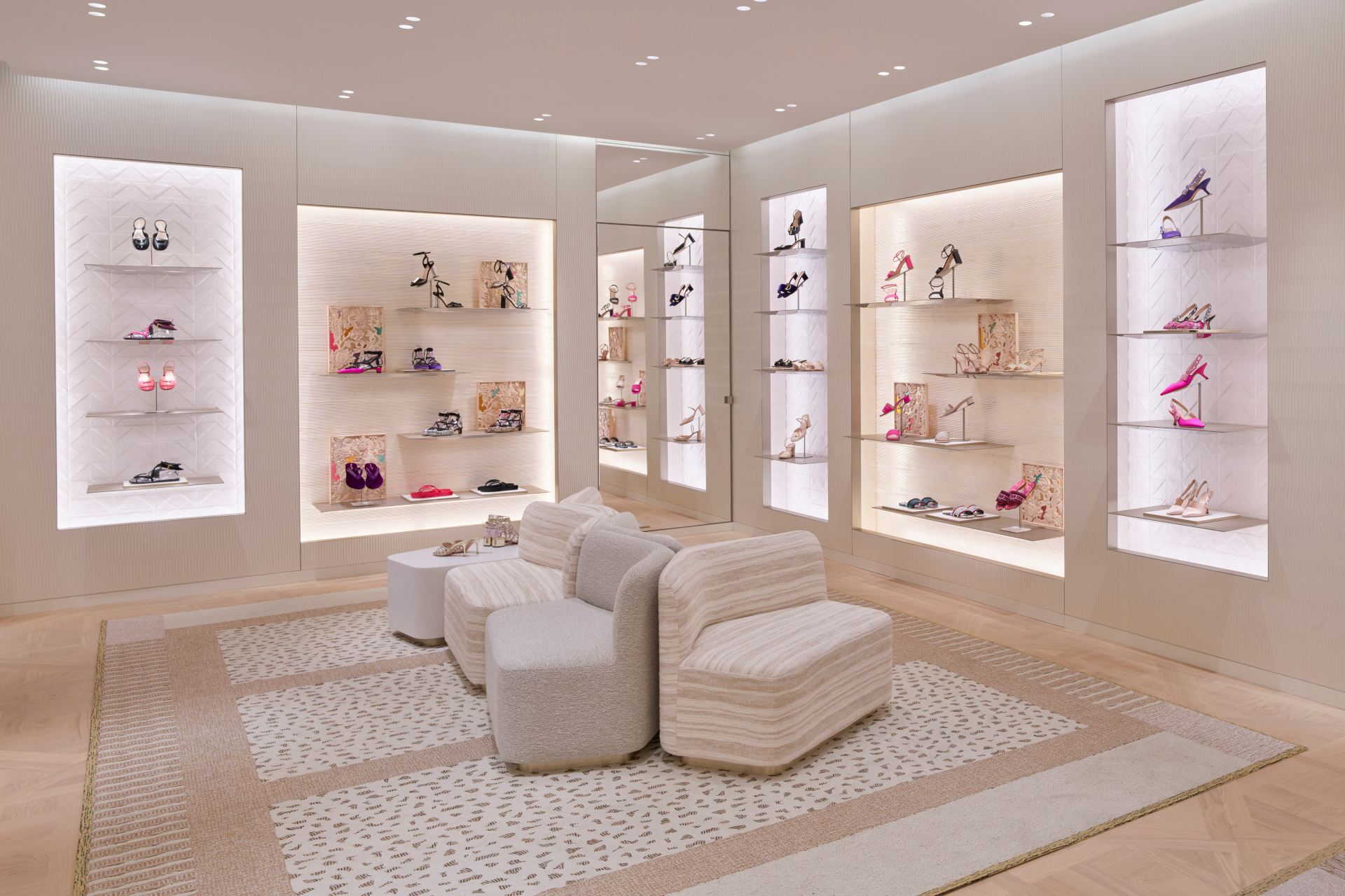 Shoes and bags on display on shelves in shop