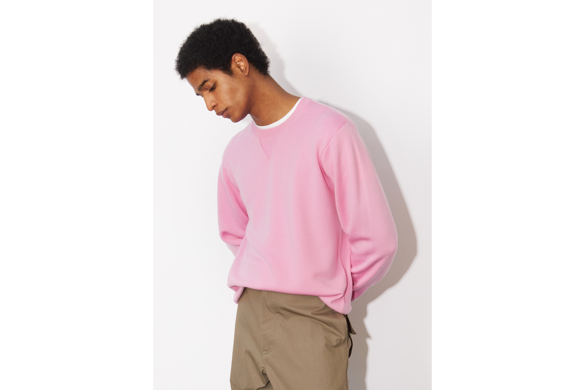 Man in pink John Smedley jumper