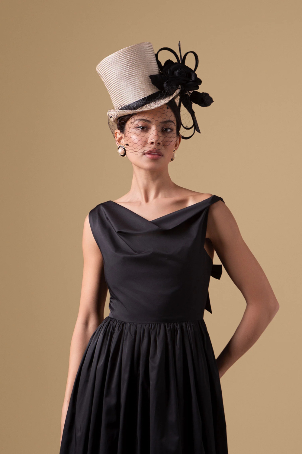 Woman wearing hat and dress
