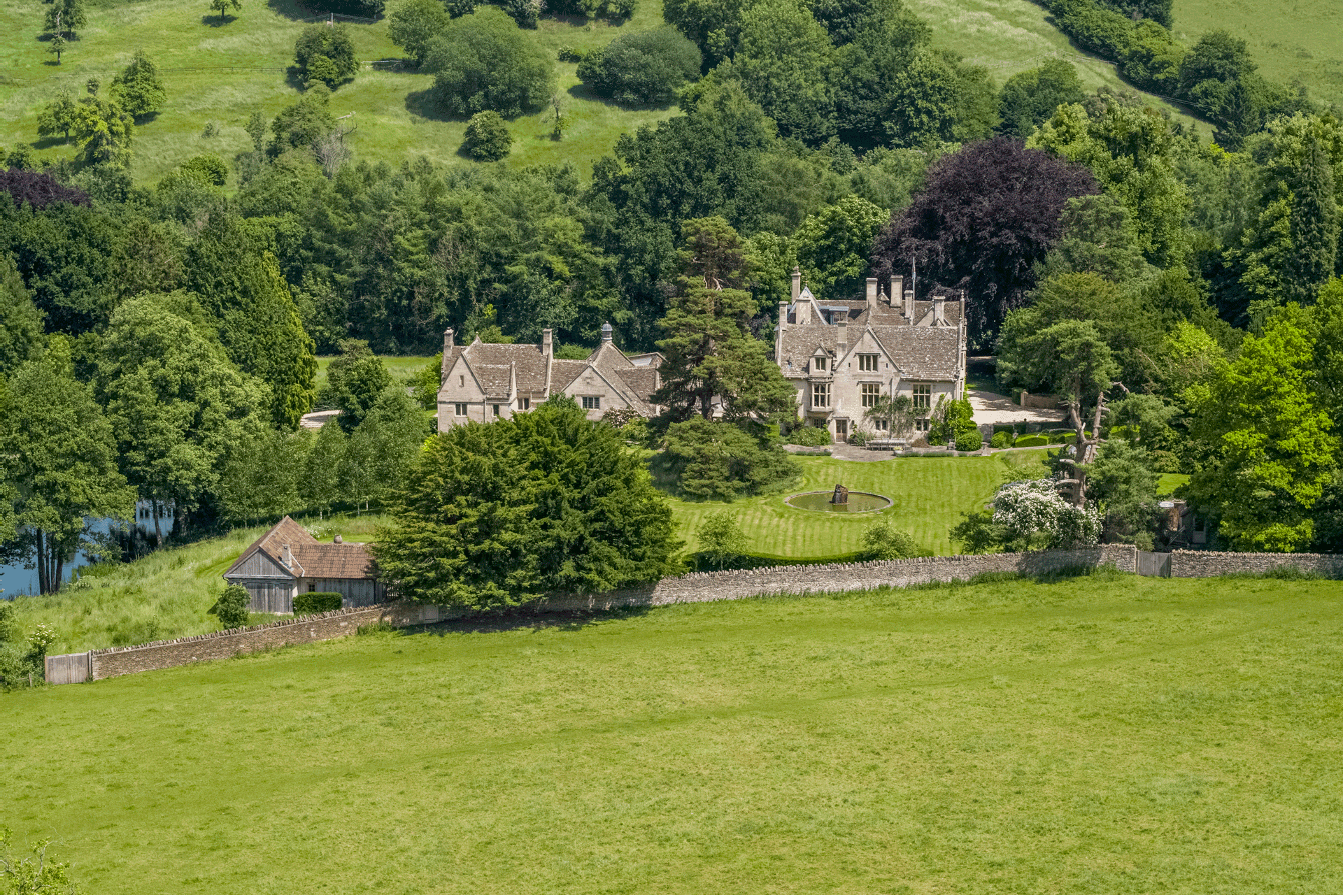 Aerial view of The Old Priory, a Cotswold manor house.