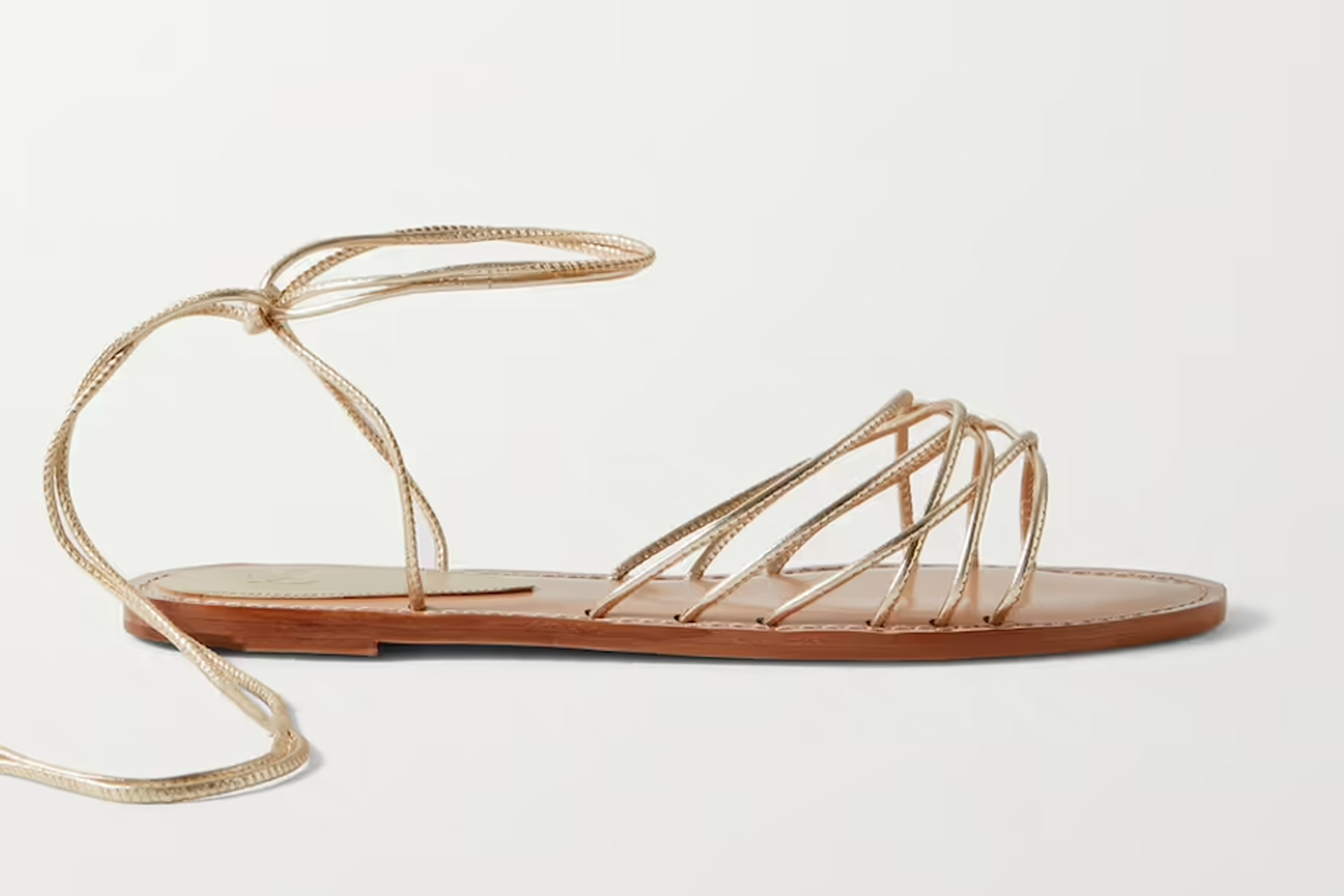 Sandals with thin leather wraparound straps.