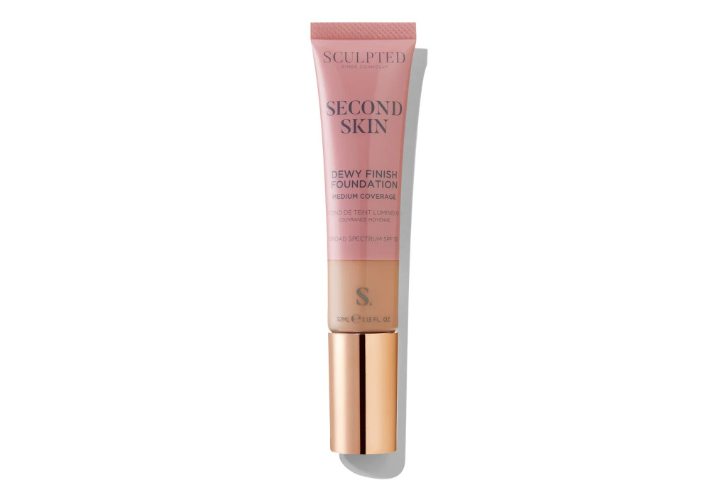 Pink tube bottle with rose gold lid