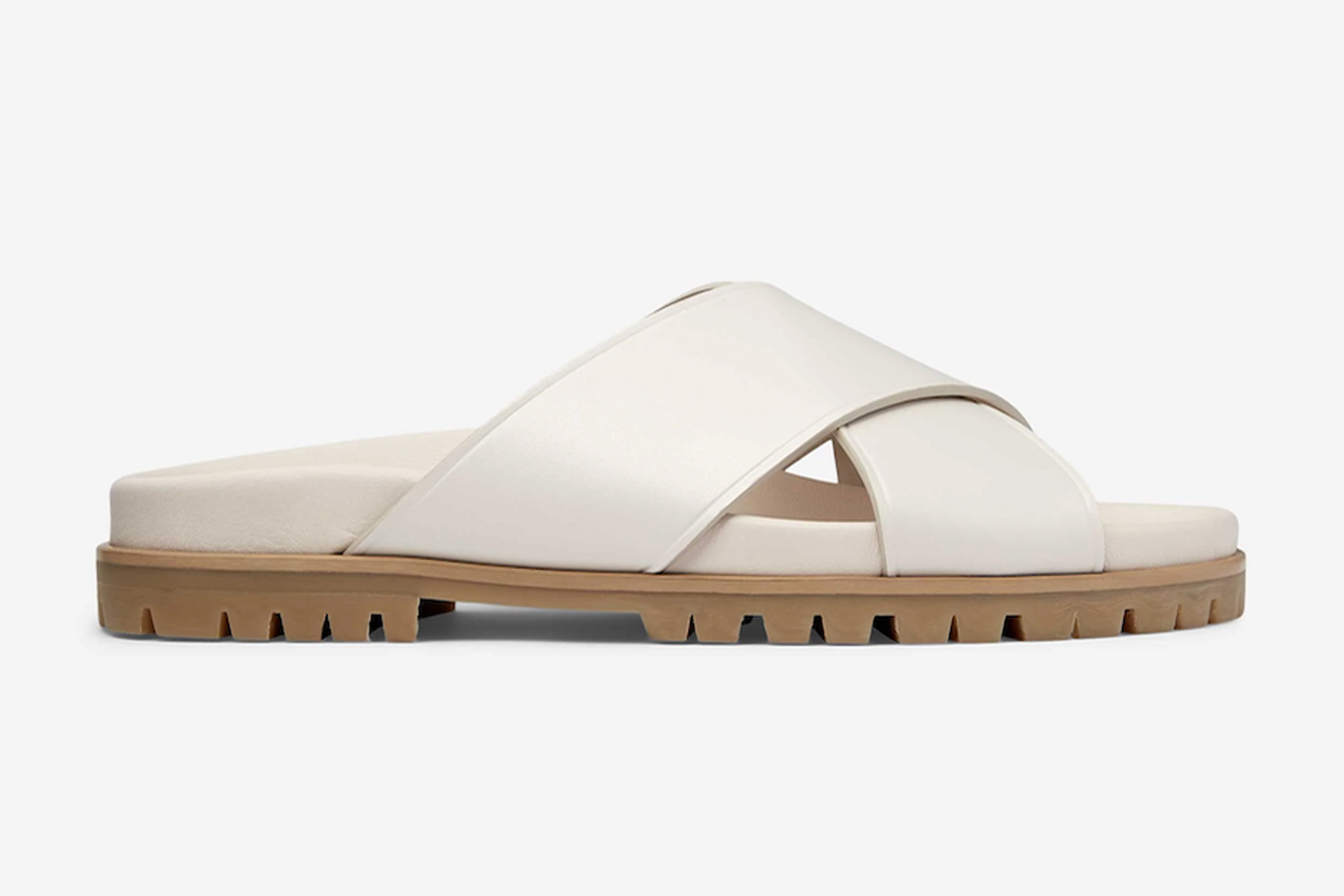 Italian leather sandals with a white criss-cross design.